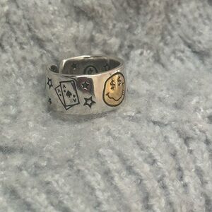 Funky sterling silver smiley money face